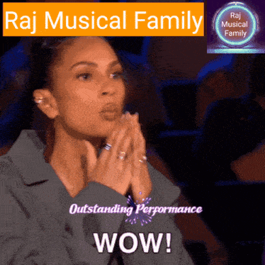 a woman with her hands folded in front of a sign that says raj musical family