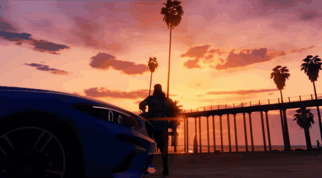 a man stands in front of a blue car with the number 0 on the front