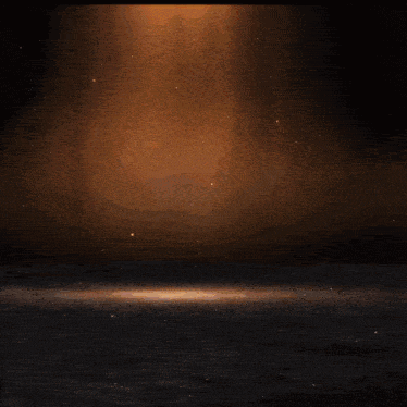 a circle of fire is surrounding a black background