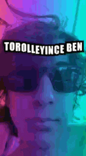 a person wearing sunglasses with the words torolleyince ben written above them