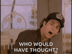 a man wearing a baseball cap is standing in front of a window and says `` who would have thought '' .