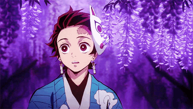 a boy wearing a fox mask with a purple background