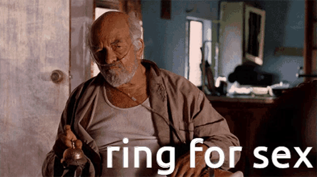 an elderly man is sitting in a chair holding a bell with the words " ring for sex " on the bottom