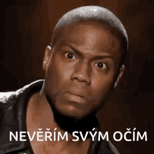 a man is making a funny face with the words neverim svým ocim written below him