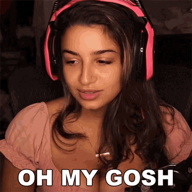 a woman wearing headphones with the words oh my gosh on the bottom
