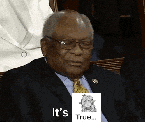 a man in a suit and tie is sitting in front of a picture that says " it 's true "