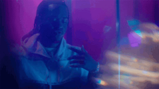 a man wearing a jacket that says nike on the front