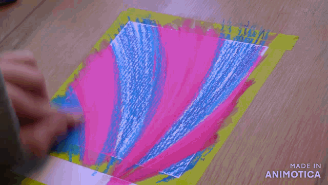 a person is painting on a piece of paper made in animotica