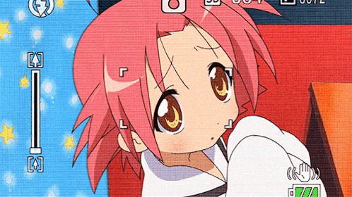 a girl with pink hair is being photographed with a camera