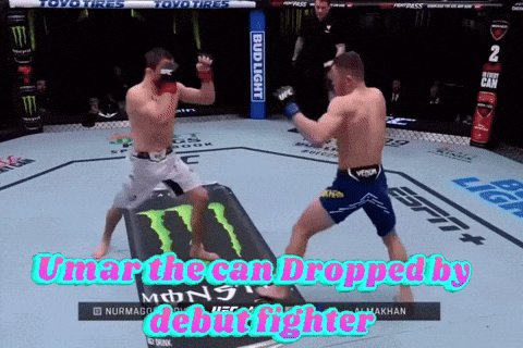 two men are fighting in a boxing ring with the words " umar the can dropped by debut fighter " on the bottom