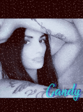 a black and white photo of a woman with the word candy on the bottom right