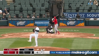 a baseball game is being played in front of a banner that says progressive