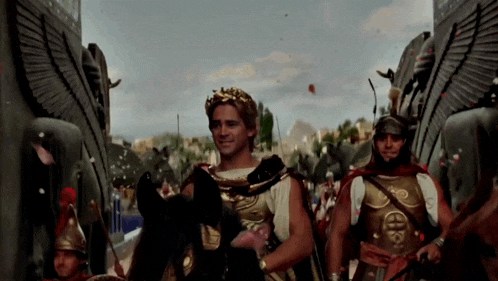 a man wearing a crown is riding a horse in a crowd of soldiers