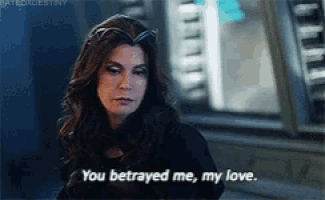 a woman in a black dress is saying `` you betrayed me , my love '' .