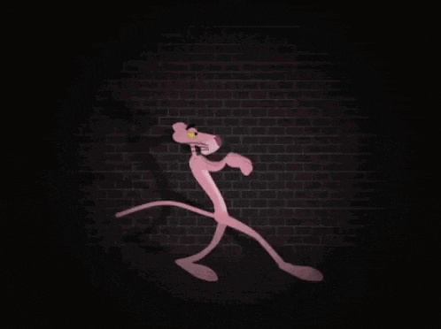 a pink panther is running in the dark against a brick wall
