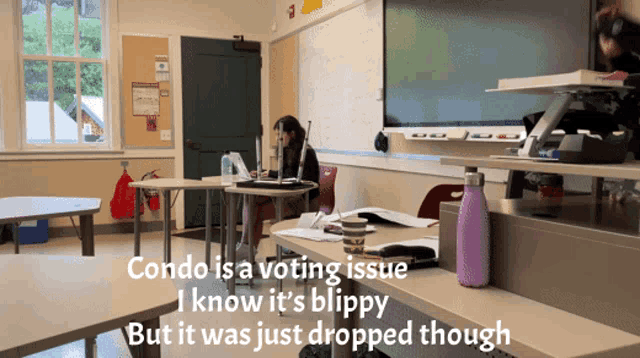 a woman sits at a desk in a classroom with the words condo is a voting issue