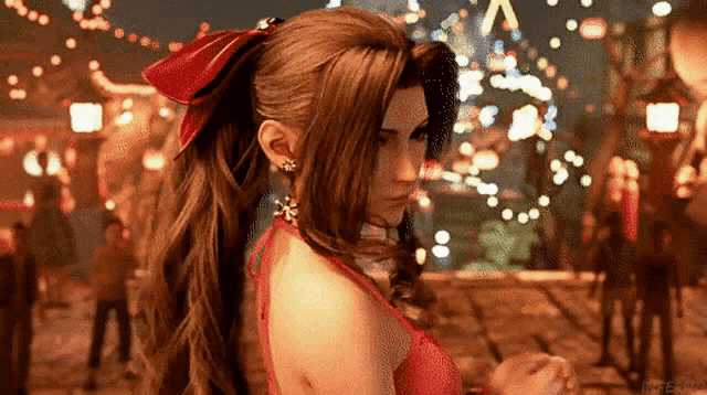 a woman in a red dress with a red bow in her hair