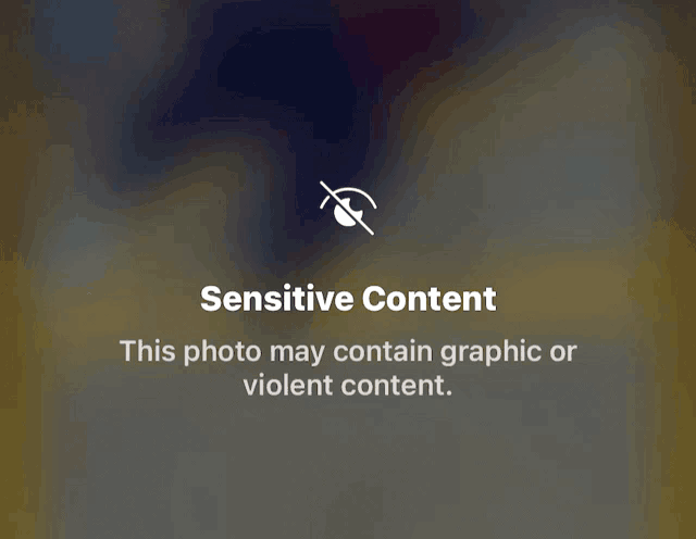 a sensitive content message is displayed on the screen