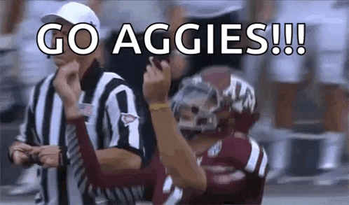 a referee is standing next to a football player on the field and says `` go aggies !!! '' .