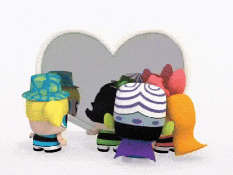 a group of cartoon characters are standing around a heart shaped mirror