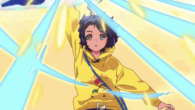 a girl in a yellow hoodie is holding a blue and purple ribbon in her hand .
