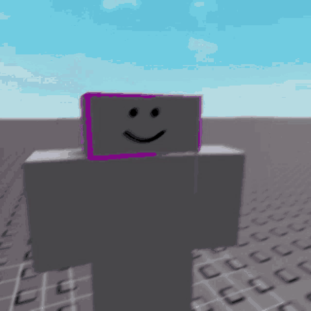 a gray block with a purple smiley face on top of it