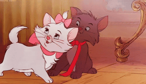 a couple of cartoon cats are standing next to each other and one has a pink bow on her head