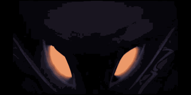 a blurry picture of a person 's face with a purple and orange background