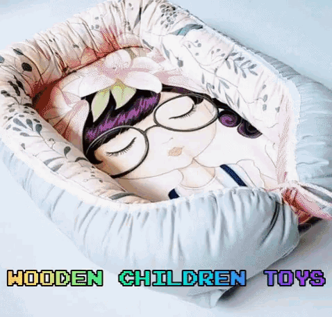 a baby nest with a picture of a girl on it and the words wooden children toys below it