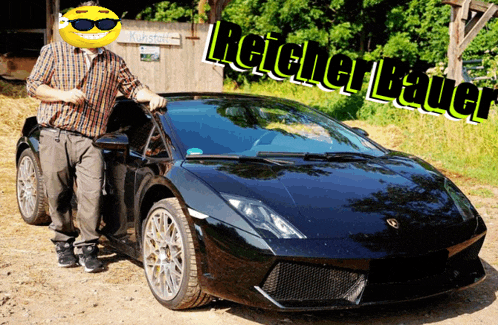 a man with a yellow smiley face on his head is standing next to a black lamborghini with the words reichler bauer above it