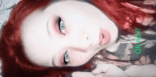 a close up of a woman 's face with the words oh no written in green