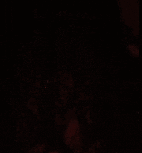 a red and black background with a smokey texture