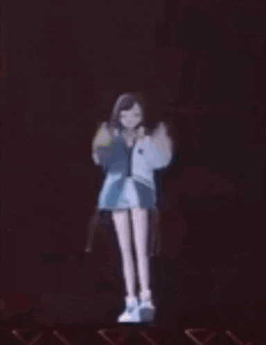 a girl is dancing on a stage in a dark room .