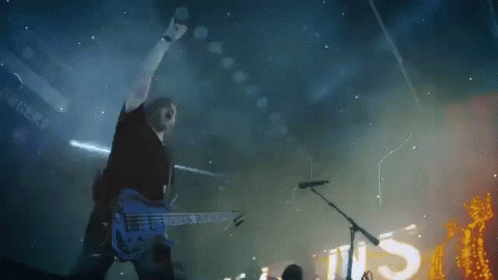 Rock Sign Rock Out GIF - Rock Sign Rock Out Bassist GIFs