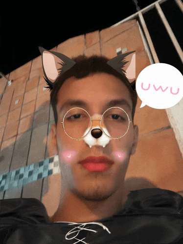 a man wearing glasses and a cat mask says uwu