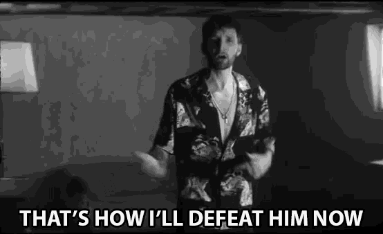 a black and white photo of a man with the words that 's how i 'll defeat him now above him