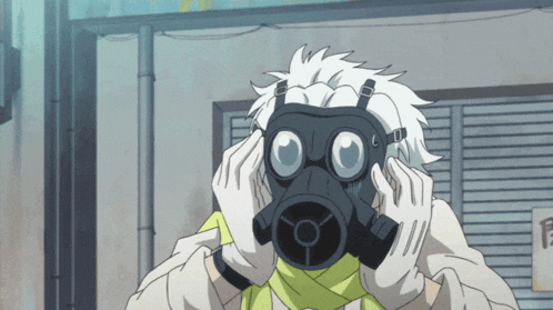 a person wearing a gas mask with a yellow scarf around his neck