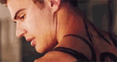 a close up of a man 's face and neck .