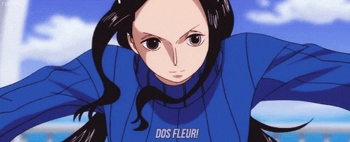 a girl in a blue sweater with the words dos fleur on it