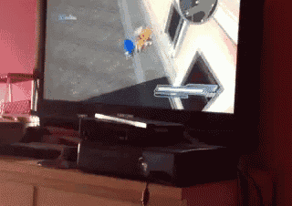 a samsung television is playing a video game on a table
