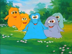 a group of cartoon characters are standing in a field and smiling