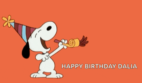 snoopy wearing a party hat is blowing a party horn .