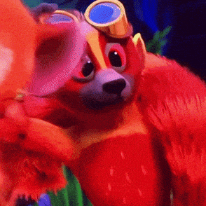 a close up of a red bear wearing goggles and a hat