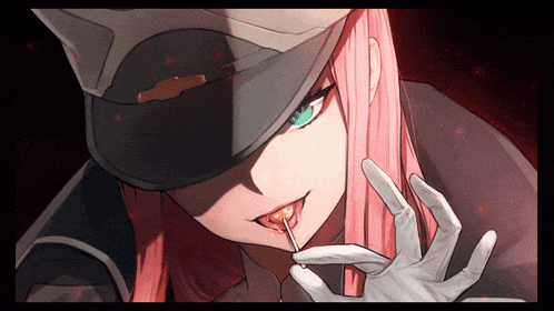 a girl with pink hair wearing a hat and gloves is holding a lollipop in her mouth