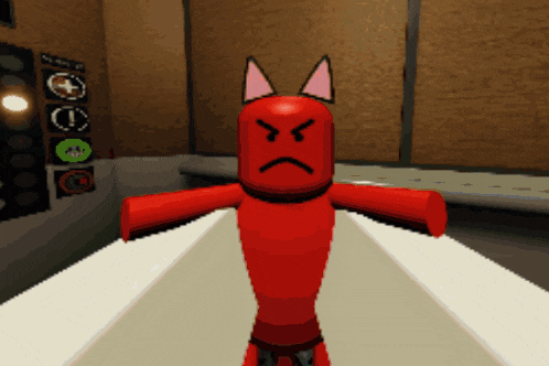 a red cartoon character with an angry face