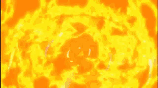a close up of a person 's face surrounded by flames .