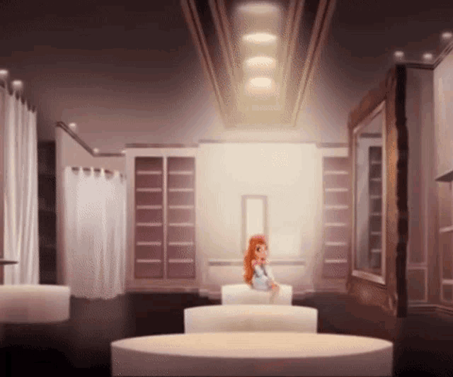 a girl is sitting on a couch in a room with a table and mirror .