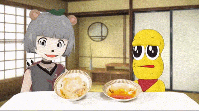 a girl and a peanut are sitting at a table with bowls of food on it