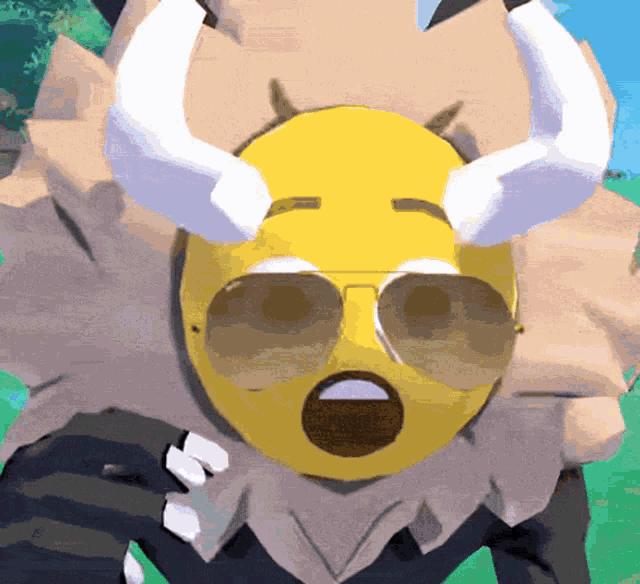 a yellow smiley face with horns and sunglasses on