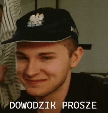 a man wearing a hat that says ' dowodzk prosze ' on the bottom